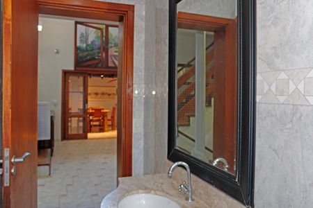 Casa de condomínio para alugar com 300m², 4 quartos e 3 vagasBanheiro 1