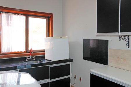 Casa de condomínio para alugar com 300m², 4 quartos e 3 vagasCozinha e Área de Serviço