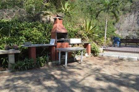 Casa de condomínio à venda com 367m², 4 quartos e 6 vagasÁrea comum - Churrasqueira