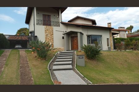 Casa de condomínio para alugar com 336m², 4 quartos e 4 vagasFachada