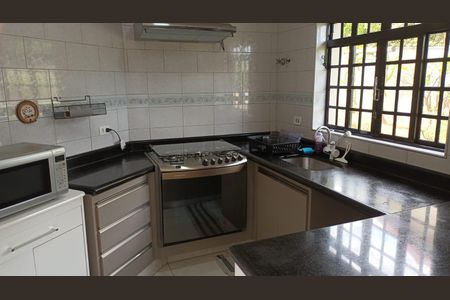 Casa de condomínio para alugar com 336m², 4 quartos e 4 vagasCozinha