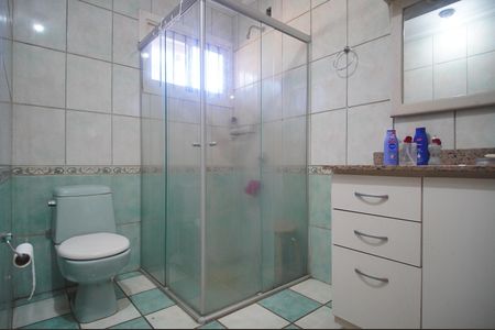 Casa à venda com 390m², 4 quartos e 2 vagasBanheiro da Suíte 2