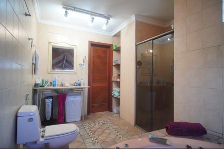 Casa à venda com 390m², 4 quartos e 2 vagasBanheiro da Suíte 1