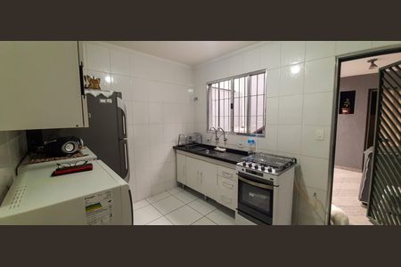 Casa à venda com 125m², 2 quartos e 2 vagas Casa à venda com 125m², 2 quartos e 2 vagasCozinha