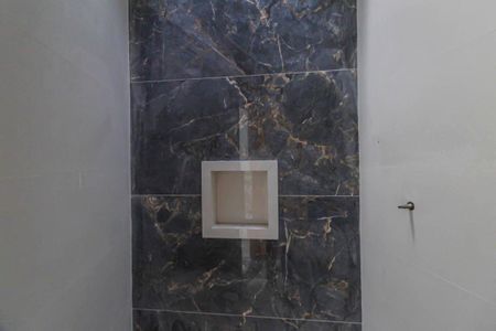 Casa à venda com 70m², 2 quartos e 2 vagas Casa à venda com 70m², 2 quartos e 2 vagasBanheiro da Suíte 1