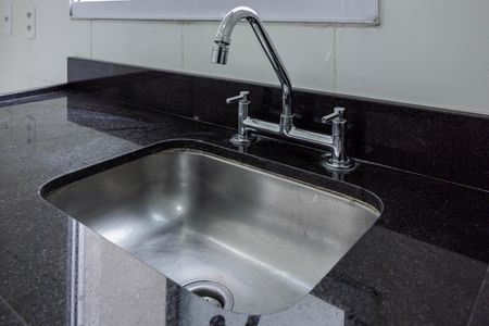 Apartamento à venda com 40m², 2 quartos e 1 vaga Apartamento à venda com 40m², 2 quartos e 1 vagaCozinha e Área de Serviço