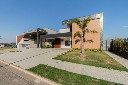 Casa de condomínio para alugar com 237m², 4 quartos e 6 vagasFachada 