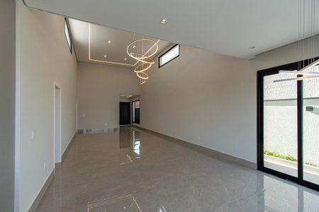 Casa de condomínio para alugar com 237m², 4 quartos e 6 vagasSala