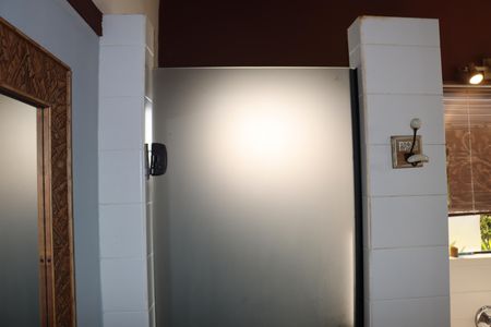 Casa de condomínio para alugar com 323m², 4 quartos e 5 vagasBanheiro da Suíte 2