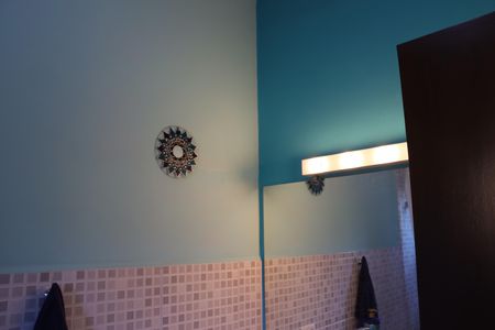 Casa de condomínio para alugar com 323m², 4 quartos e 5 vagasBanheiro da Suíte 1