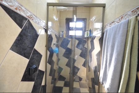 Casa à venda com 200m², 7 quartos e 7 vagasBanheiro da Suíte 1