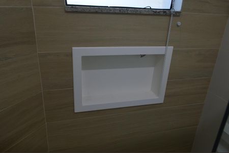 Casa de condomínio à venda com 180m², 3 quartos e 1 vagaBanheiro da Suíte 1