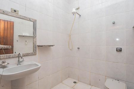 Casa à venda com 410m², 4 quartos e 8 vagasBanheiro de Serviço