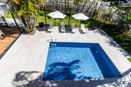 Casa de condomínio à venda com 460m², 4 quartos e 4 vagas Casa de condomínio à venda com 460m², 4 quartos e 4 vagasVista da Suíte