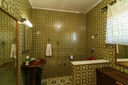 Casa à venda com 350m², 4 quartos e 2 vagasBanheiro da Suíte