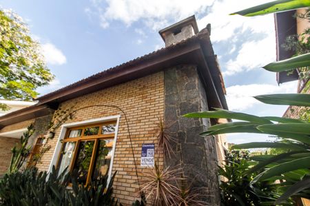 Casa de condomínio à venda com 300m², 4 quartos e 4 vagasFachada