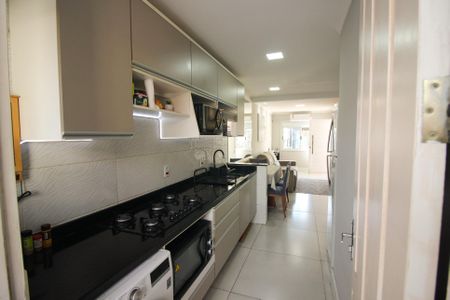 Casa à venda com 60m², 2 quartos e 2 vagas Casa à venda com 60m², 2 quartos e 2 vagasCozinha e Área de Serviço