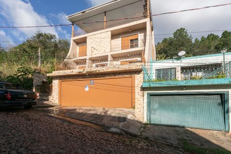 Casa à venda com 500m², 4 quartos e 3 vagas Casa à venda com 500m², 4 quartos e 3 vagasFachada da casa