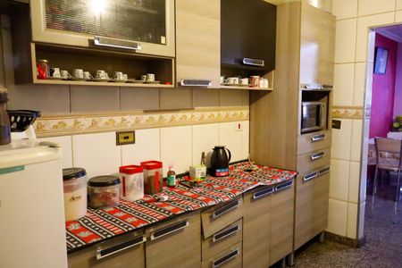 Casa à venda com 151m², 4 quartos e 3 vagas Casa à venda com 151m², 4 quartos e 3 vagasCozinha