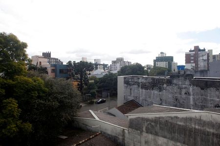 Cozinha + Área de Serviço Vista de apartamento à venda com 1 quarto, 34m² em Higienópolis, Porto Alegre