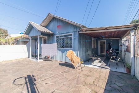 Casa 1 - Fachada de casa à venda com 5 quartos, 960m² em Cavalhada, Porto Alegre