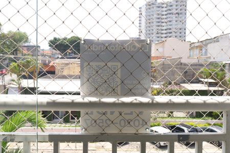 Apartamento à venda com 68m², 2 quartos e 1 vagaPlaca instalada na grade da varanda (2º andar) - Código da placa: ZNHJ-1309