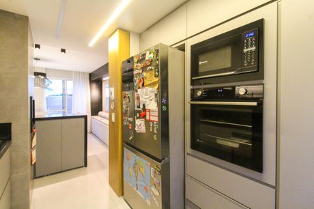 Casa de condomínio para alugar com 287m², 4 quartos e 2 vagasCozinha