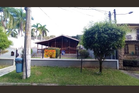 Casa de condomínio à venda com 600m², 4 quartos e 3 vagasFachada com Placa