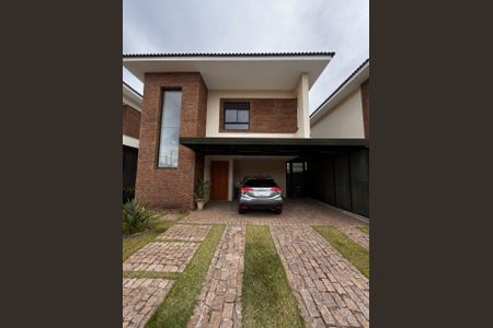 Casa de condomínio para alugar com 200m², 3 quartos e 4 vagasFachada da casa