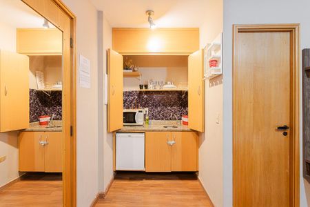 Cozinha de kitnet/studio para alugar com 1 quarto, 32m² em Jardins, São Paulo