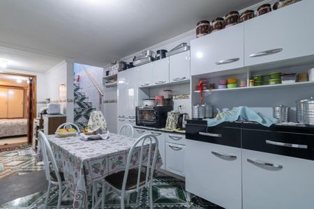 Casa à venda com 148m², 4 quartos e 4 vagas Casa à venda com 148m², 4 quartos e 4 vagasCozinha