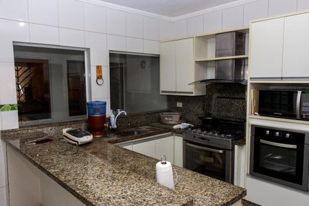 Casa à venda com 120m², 3 quartos e 3 vagas Casa à venda com 120m², 3 quartos e 3 vagasCozinha