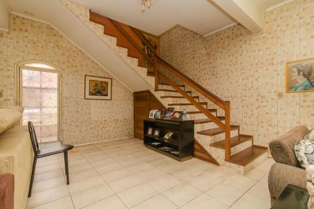 Sala de casa à venda com 3 quartos, 132m² em Guarujá, Porto Alegre