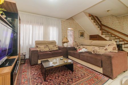 Sala de casa à venda com 3 quartos, 132m² em Guarujá, Porto Alegre