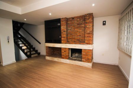 Sala 1 de casa de condomínio à venda com 3 quartos, 215m² em Jardim Isabel, Porto Alegre