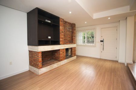 Sala 1 de casa de condomínio à venda com 3 quartos, 215m² em Jardim Isabel, Porto Alegre