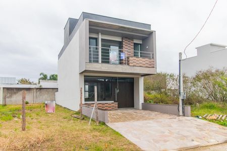 Casa à venda com 106m², 3 quartos e 2 vagasFachada