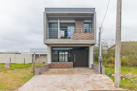 Casa à venda com 106m², 3 quartos e 2 vagasFachada