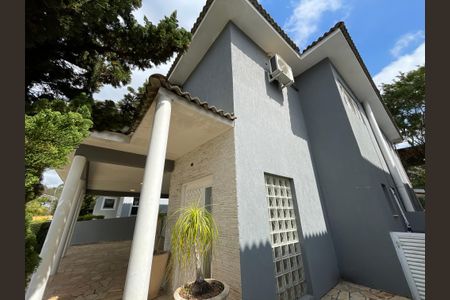 Casa de condomínio para alugar com 373m², 5 quartos e 4 vagasFachada