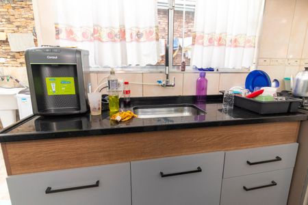 Casa à venda com 59m², 2 quartos e 2 vagas Casa à venda com 59m², 2 quartos e 2 vagasCozinha