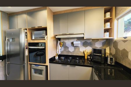 Casa de condomínio à venda com 130m², 3 quartos e 2 vagasCozinha e Área de Serviço