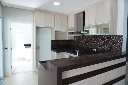 Casa de condomínio para alugar com 330m², 4 quartos e 4 vagasCozinha