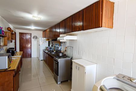 Apartamento à venda com 143m², 4 quartos e 1 vaga Apartamento à venda com 143m², 4 quartos e 1 vagaCozinha e Área de Serviço