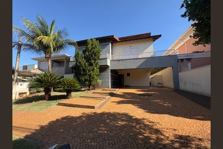 Casa de condomínio para alugar com 410m², 5 quartos e 4 vagasFachada