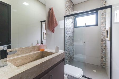 Casa de condomínio para alugar com 345m², 4 quartos e 4 vagas Casa de condomínio para alugar com 345m², 4 quartos e 4 vagasBanheiro da Suíte 1