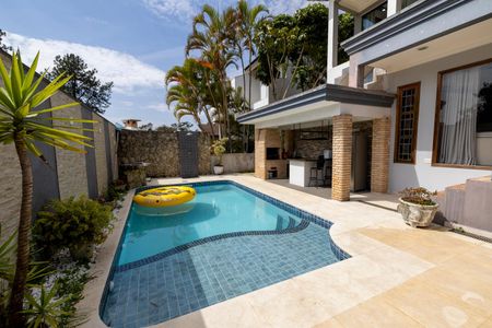 Casa de condomínio para alugar com 390m², 7 quartos e 4 vagasÁrea Externa