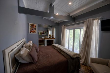 Casa de condomínio para alugar com 390m², 7 quartos e 4 vagasSuíte 3