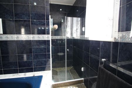 Casa de condomínio à venda com 600m², 3 quartos e 4 vagasBanheiro da Suíte