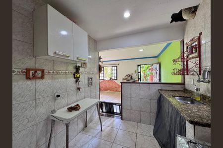 Casa de condomínio à venda com 150m², 2 quartos e 2 vagas Casa de condomínio à venda com 150m², 2 quartos e 2 vagasCozinha e Área de Serviço