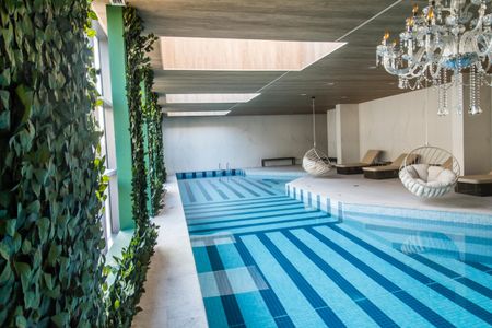 Apartamento à venda com 64m², 2 quartos e 1 vaga Apartamento à venda com 64m², 2 quartos e 1 vagaÁrea comum - Piscina Coberta